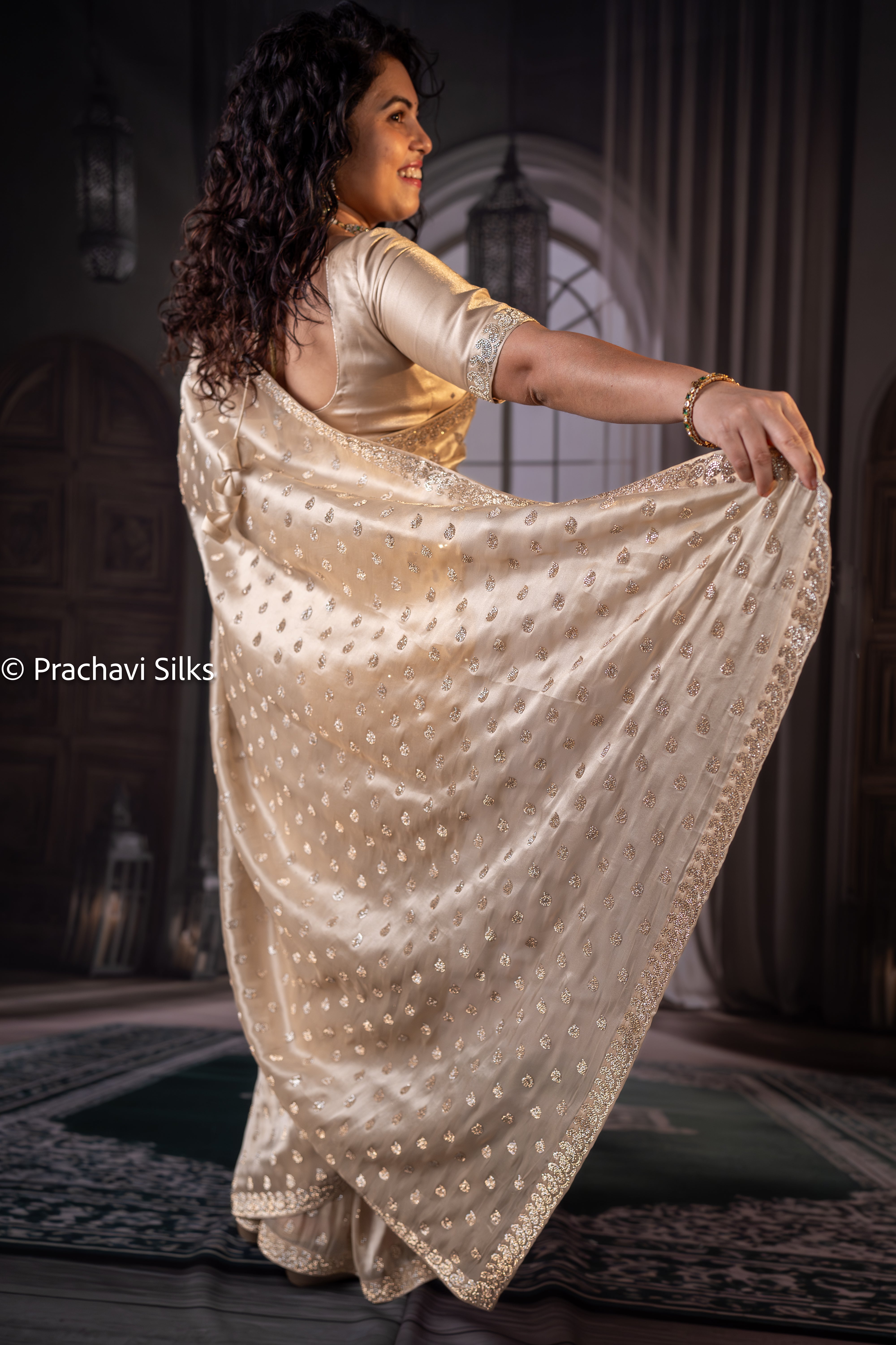 Shimmer Organza Saree in Champagne Gold with Glass Diamond Butta & Designer Border