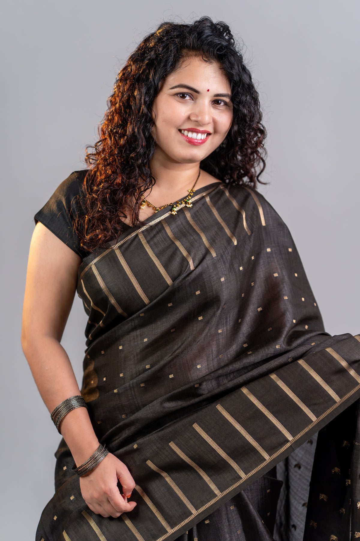 Black Tissue Silk Saree – Classic Gold Zari Elegance