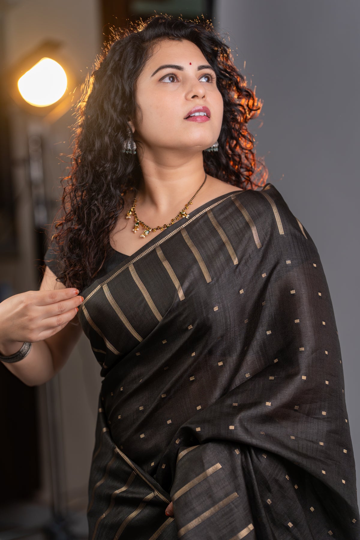 Black Tissue Silk Saree – Classic Gold Zari Elegance