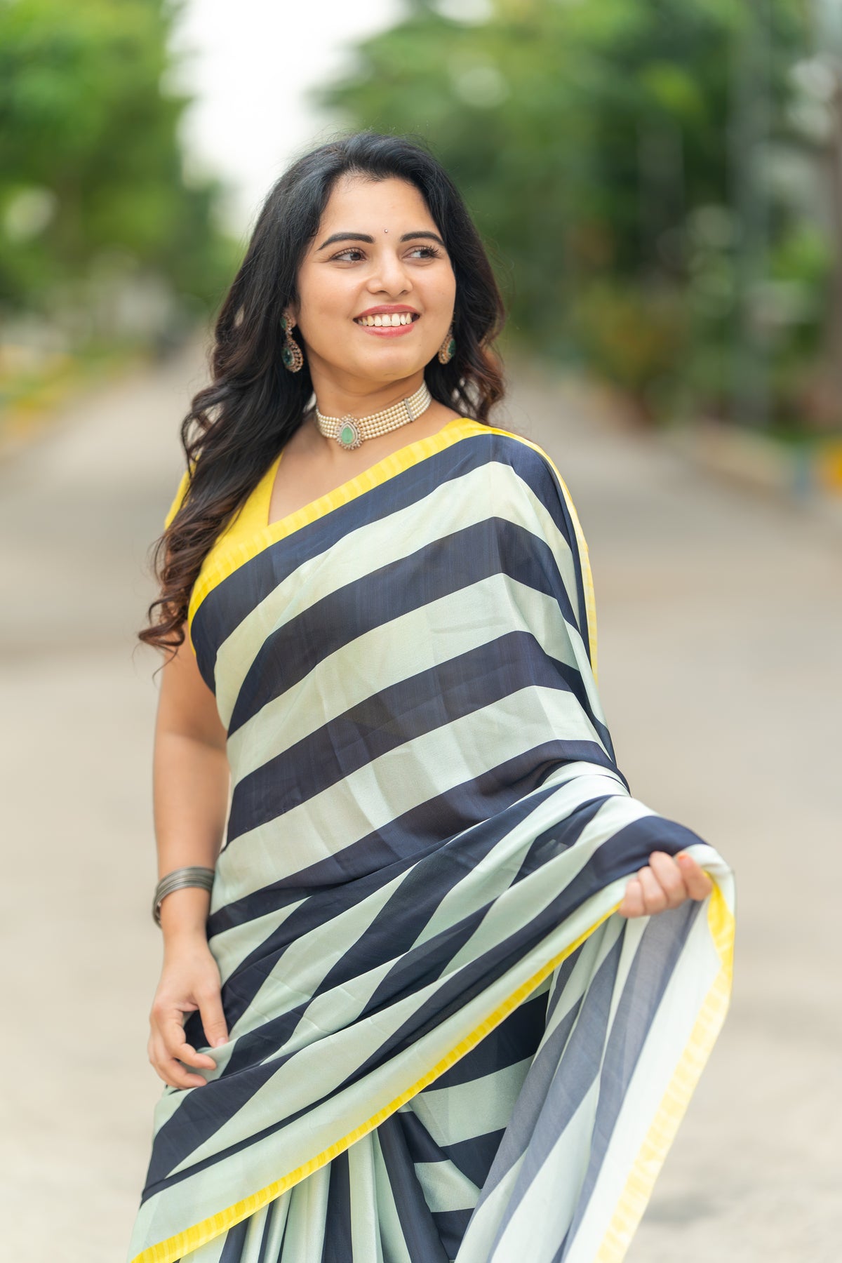 Ivory & Navy Blue Striped Saree with Floral Border