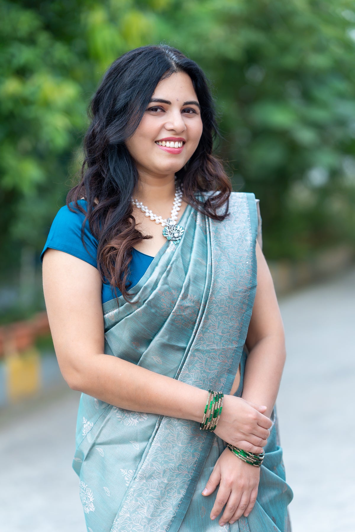Elegant Teal Blue Soft Silk Saree with Woven Floral Border