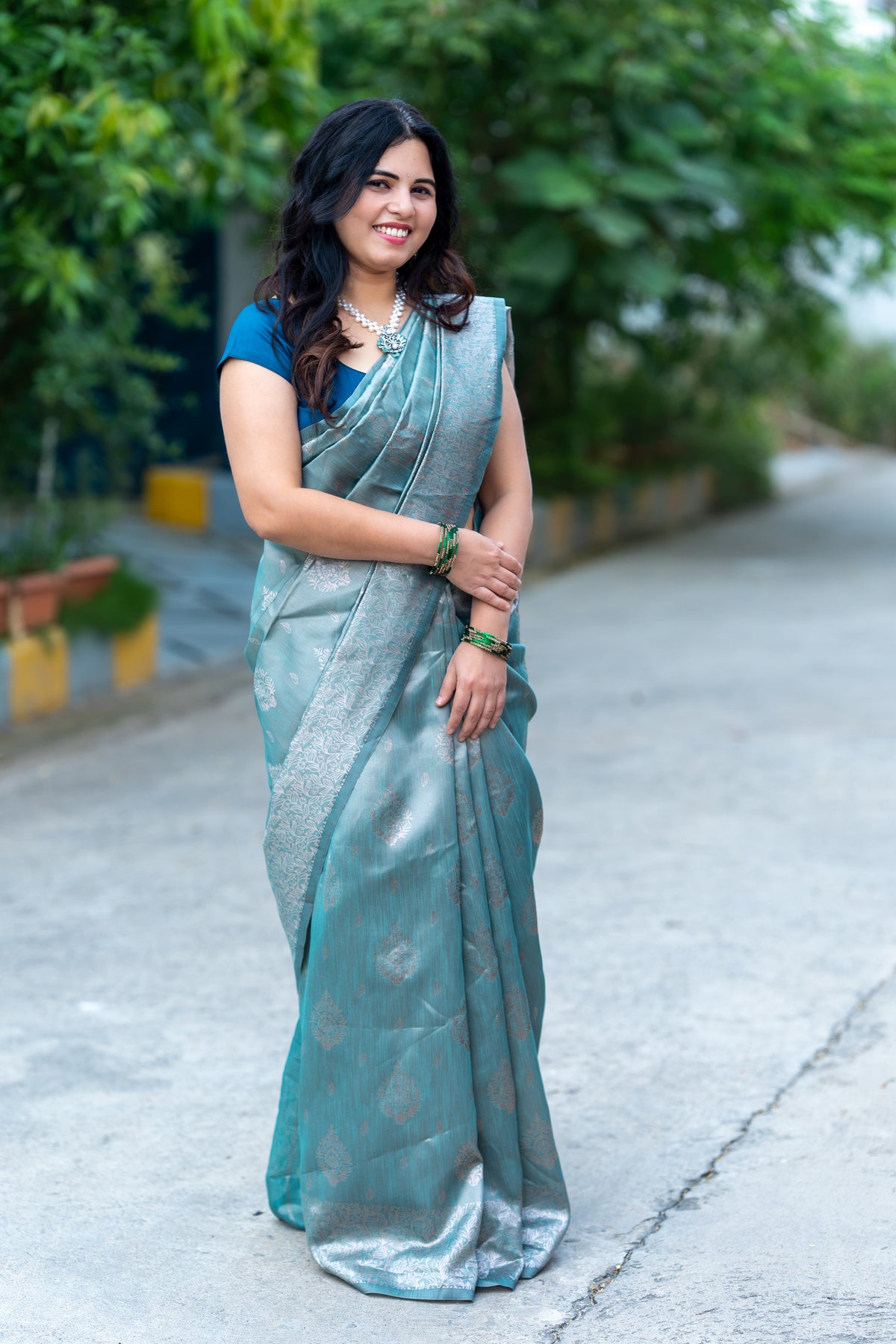 Elegant Teal Blue Soft Silk Saree with Woven Floral Border