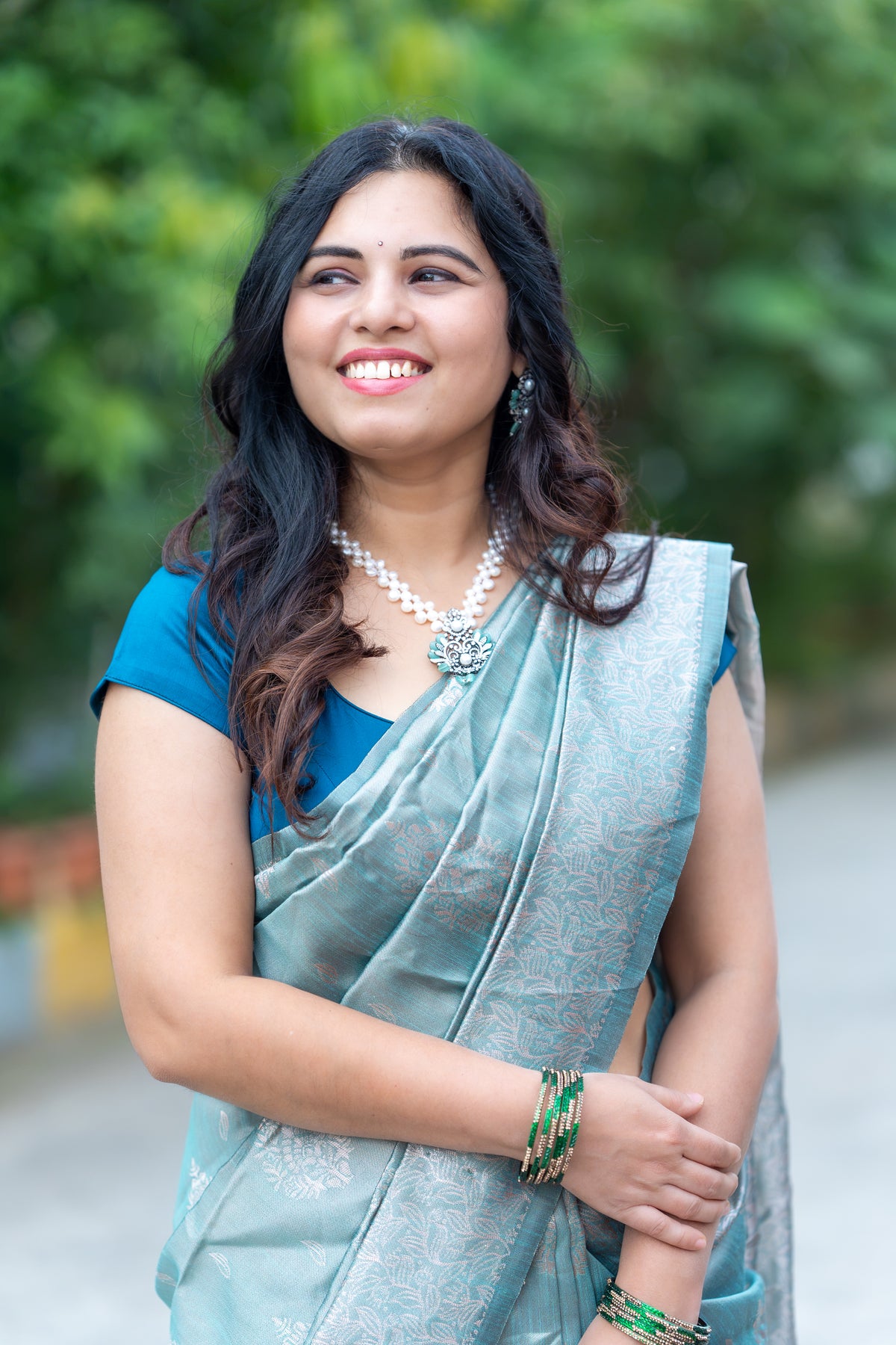 Elegant Teal Blue Soft Silk Saree with Woven Floral Border