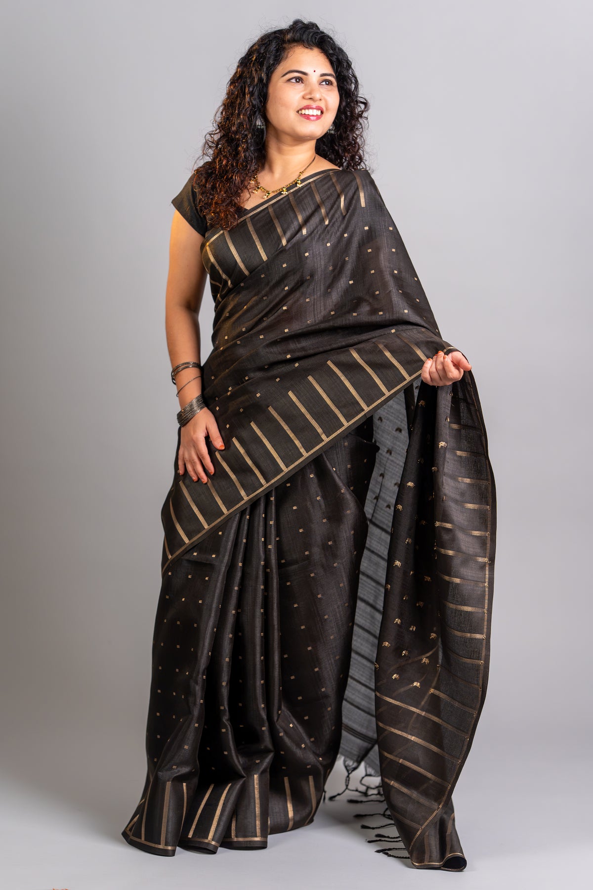Black Tissue Silk Saree – Classic Gold Zari Elegance