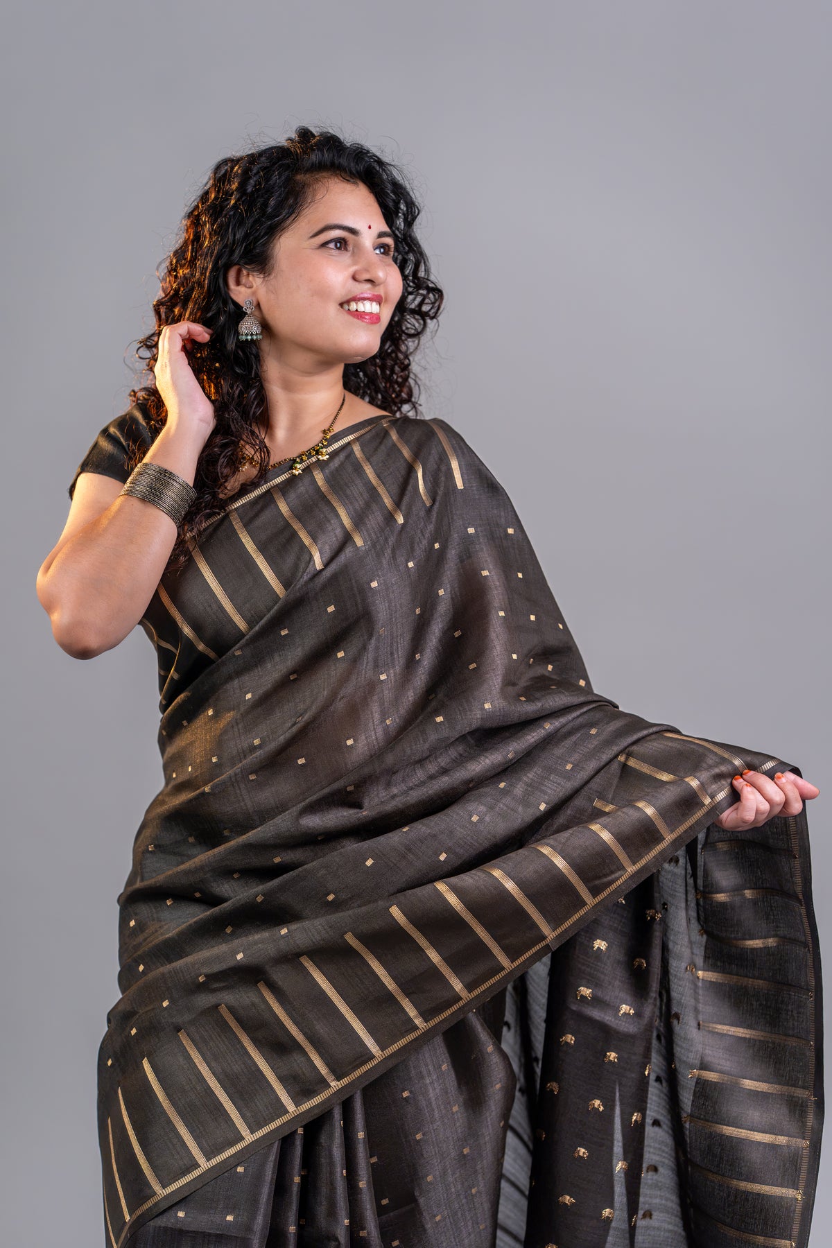 Black Tissue Silk Saree – Classic Gold Zari Elegance