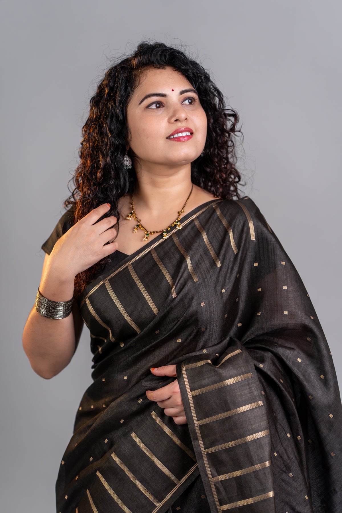 Black Tissue Silk Saree – Classic Gold Zari Elegance