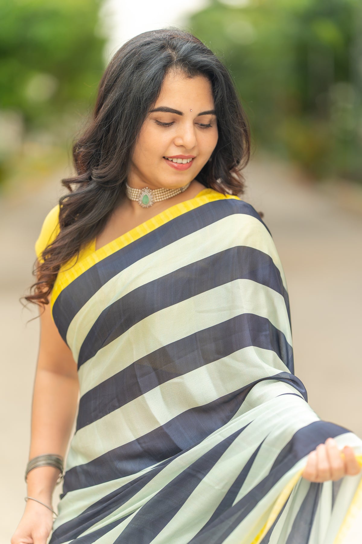 Ivory & Navy Blue Striped Saree with Floral Border